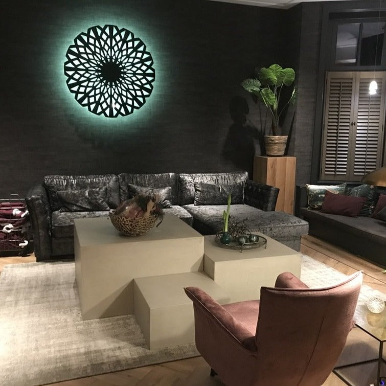 KuvaLight Amsterdam in Piano Black with a green light n a home setting at night.