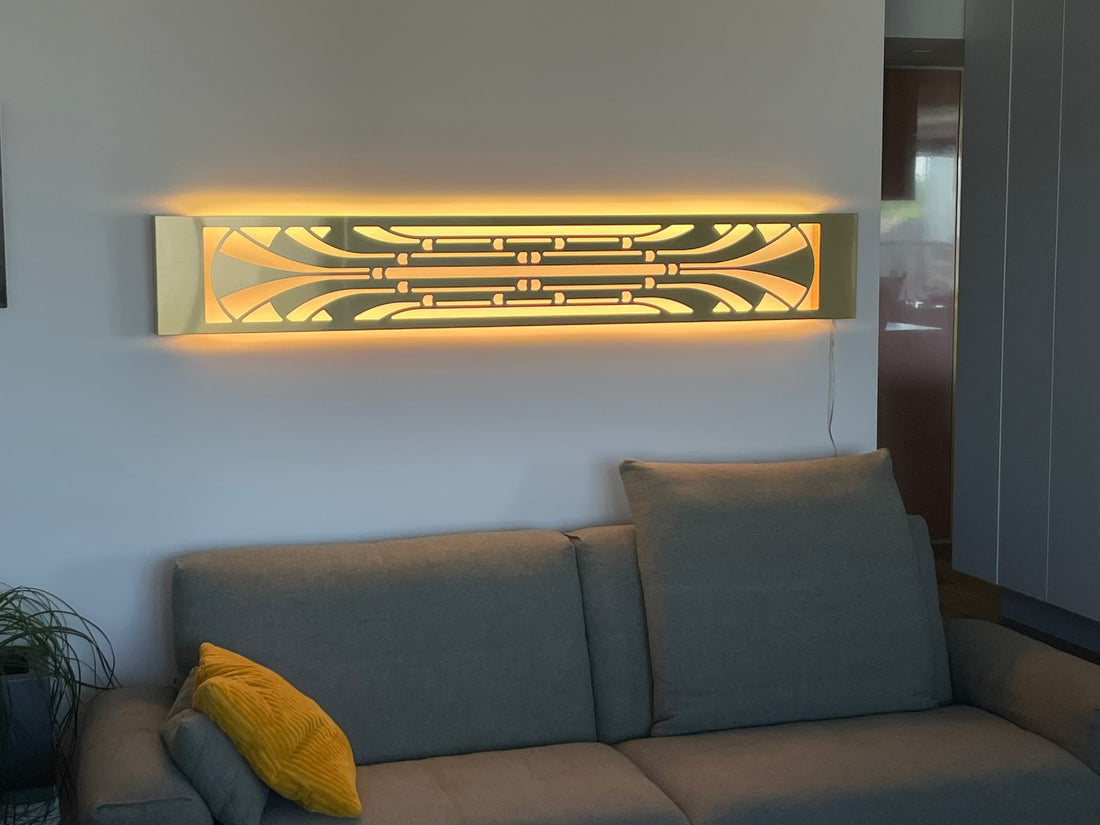 KuvaLight Art Deco Miami Slim wall light in brushed finish, vertically mounted at the end of a hallway with warm light on.