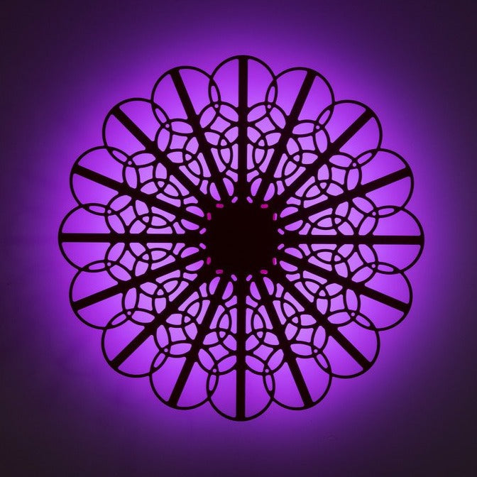KuvaLight Braga in Piano Black with a purple light at night. (80cm)