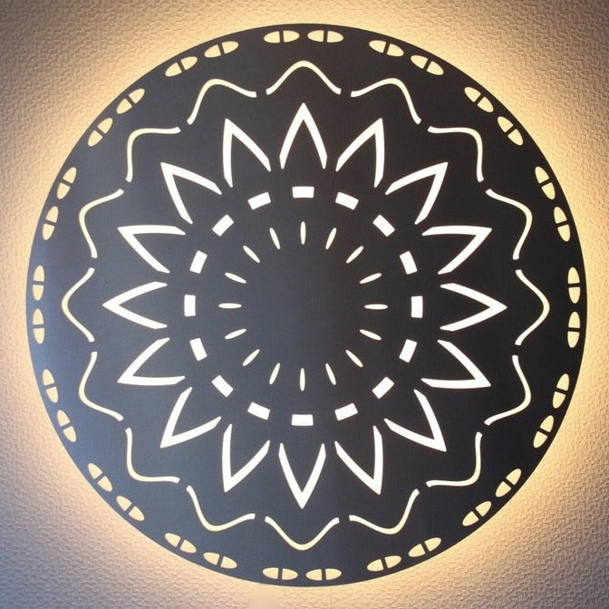 KuvaLight New Beginning in brushed aluminum with a warm white light photographed in the evening.