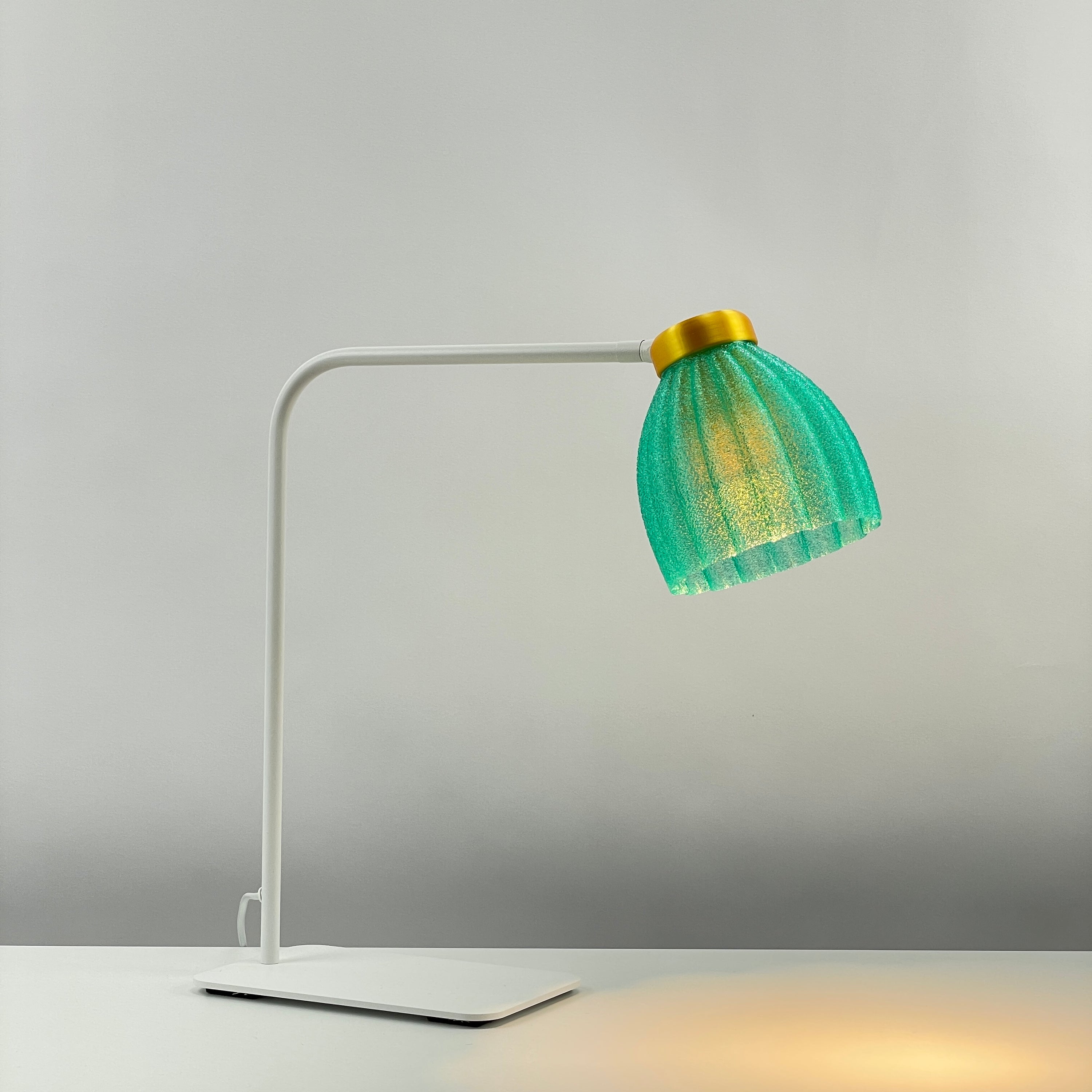 Blossom_white_table_desk_light –  clear_turquoise-diffuser_yellow_metallic_frosted_on 