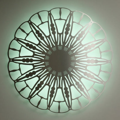 KuvaLight Anemoon in  brushed aluminium with a peppermint green color light during the day. 