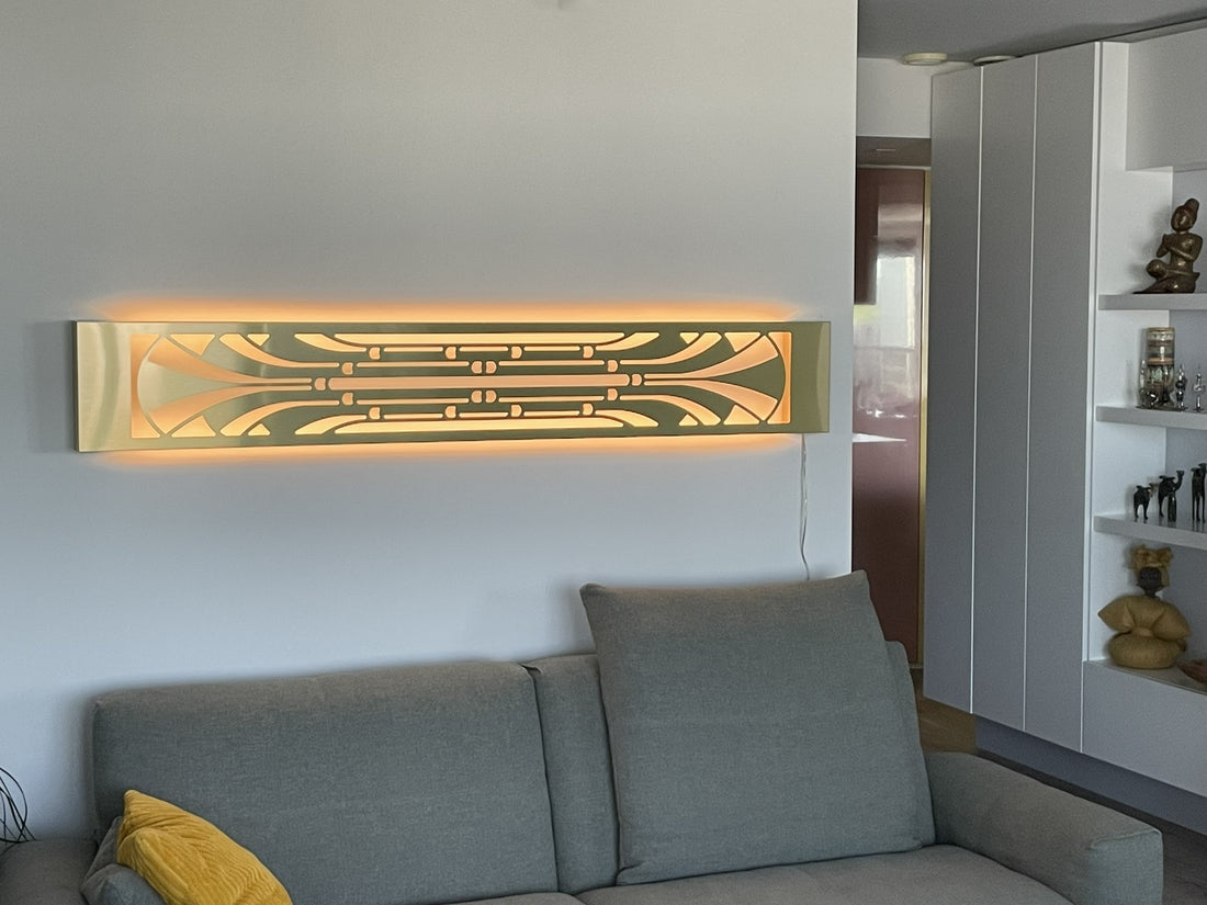 KuvaLight Art Deco Miami Slim wall light installed horizontally above a modern couch, emitting warm ambient light.