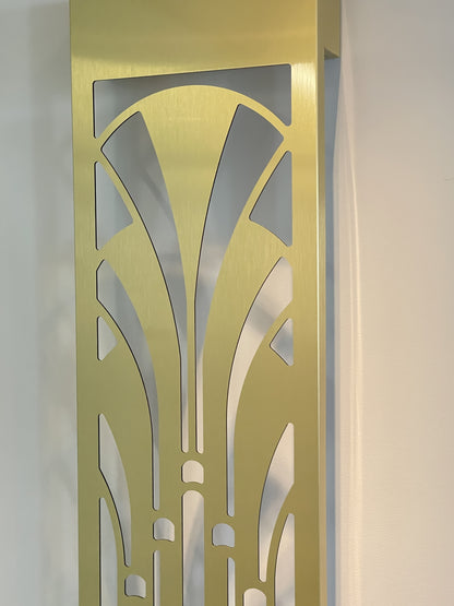 Close-up of vertically mounted KuvaLight Art Deco Miami Slim wall light in brushed finish with light off, showing symmetrical Deco detail.