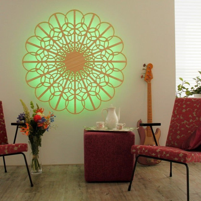 KuvaLight Braga in Bamboo with a spring green light in a teatime setting with Gispen chairs and a guitar.