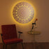 KuvaLight New Beginning in brushed aluminum (80cm) in a home evening setting with a yellow color light which creates a warm atmosphere.